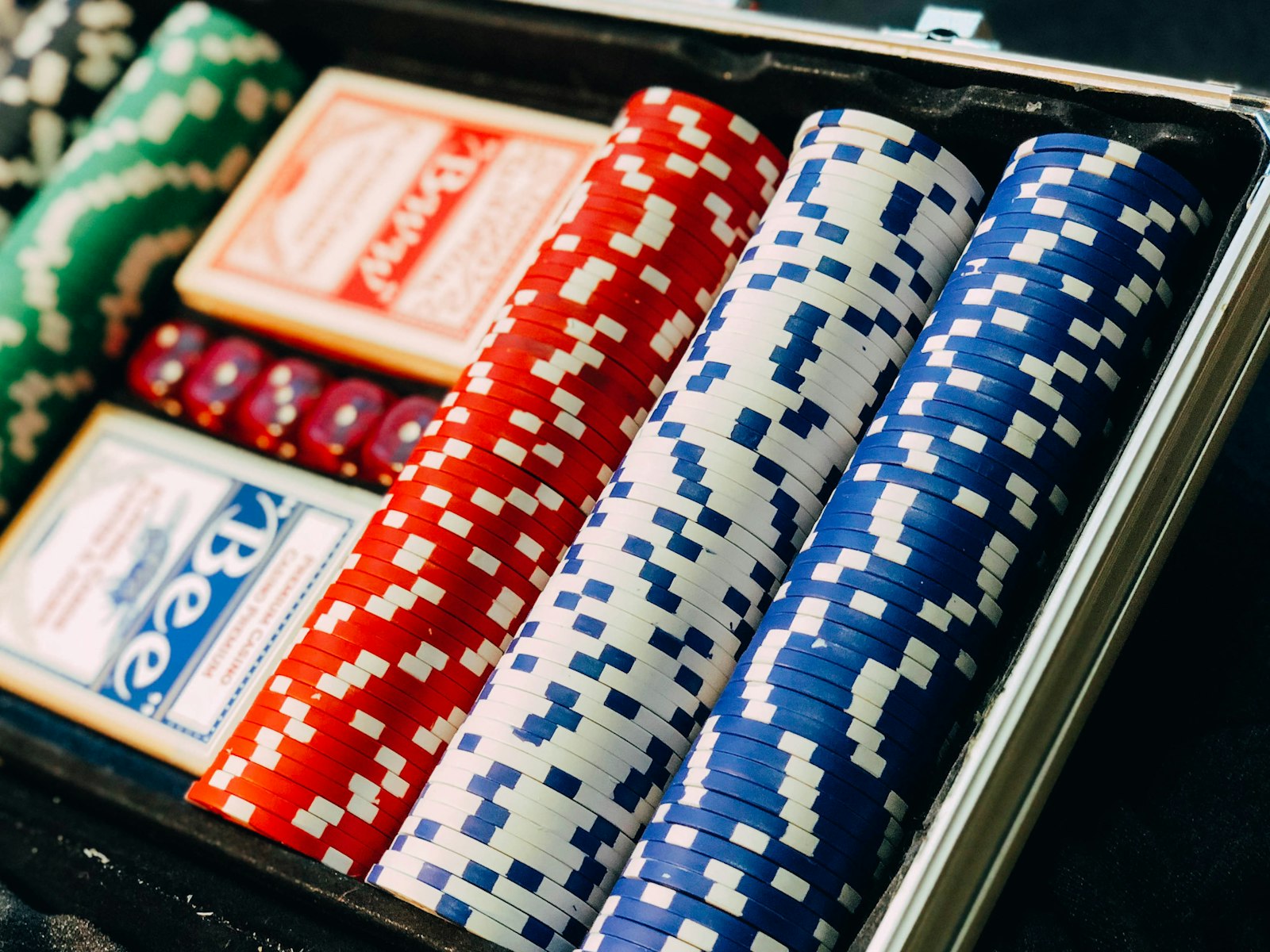 Close-up of a poker chip set arranged in a case